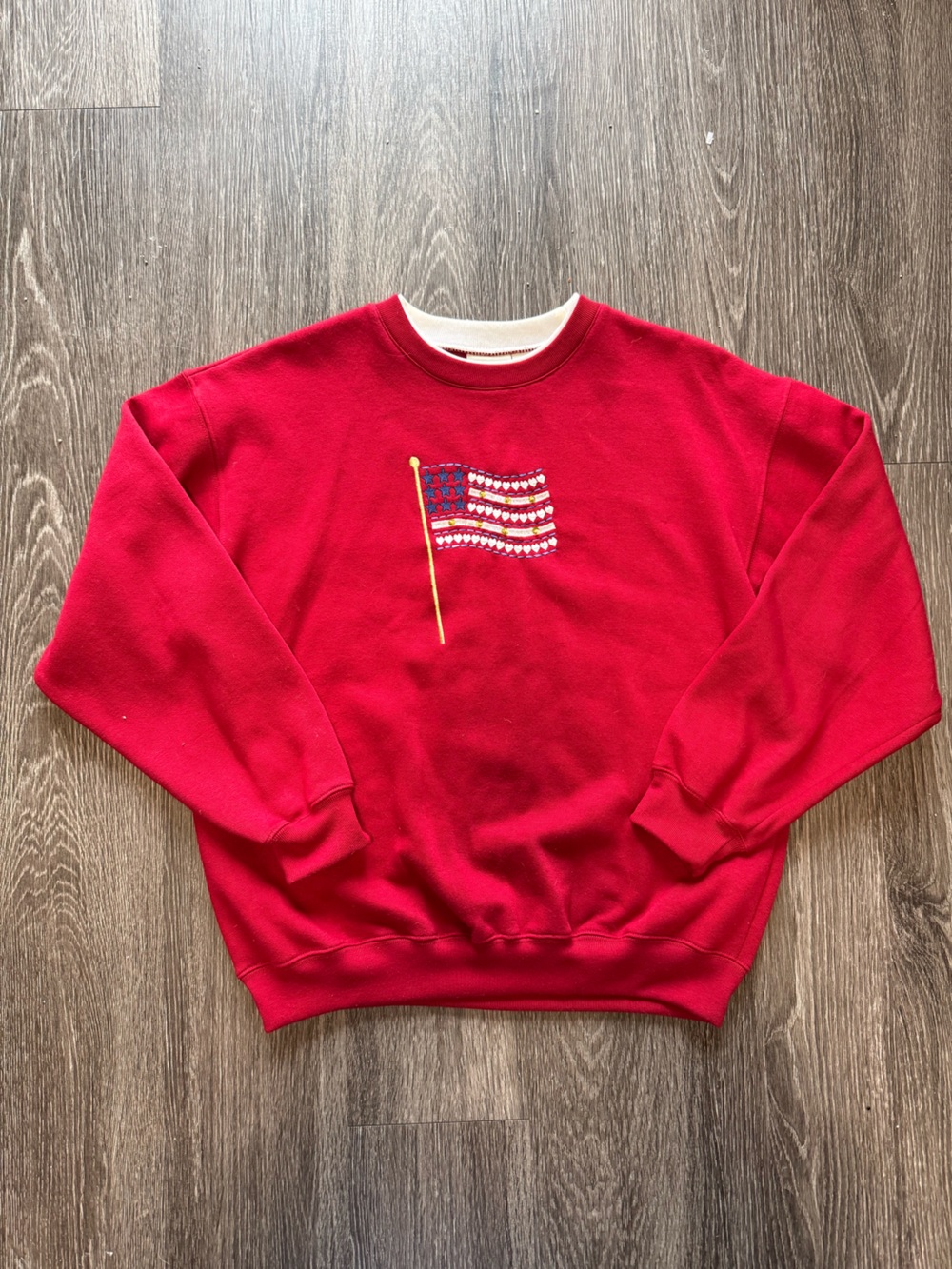 Womens Red Crewneck Sweatshirt with Embroidered Flag Detail and Rhinestones